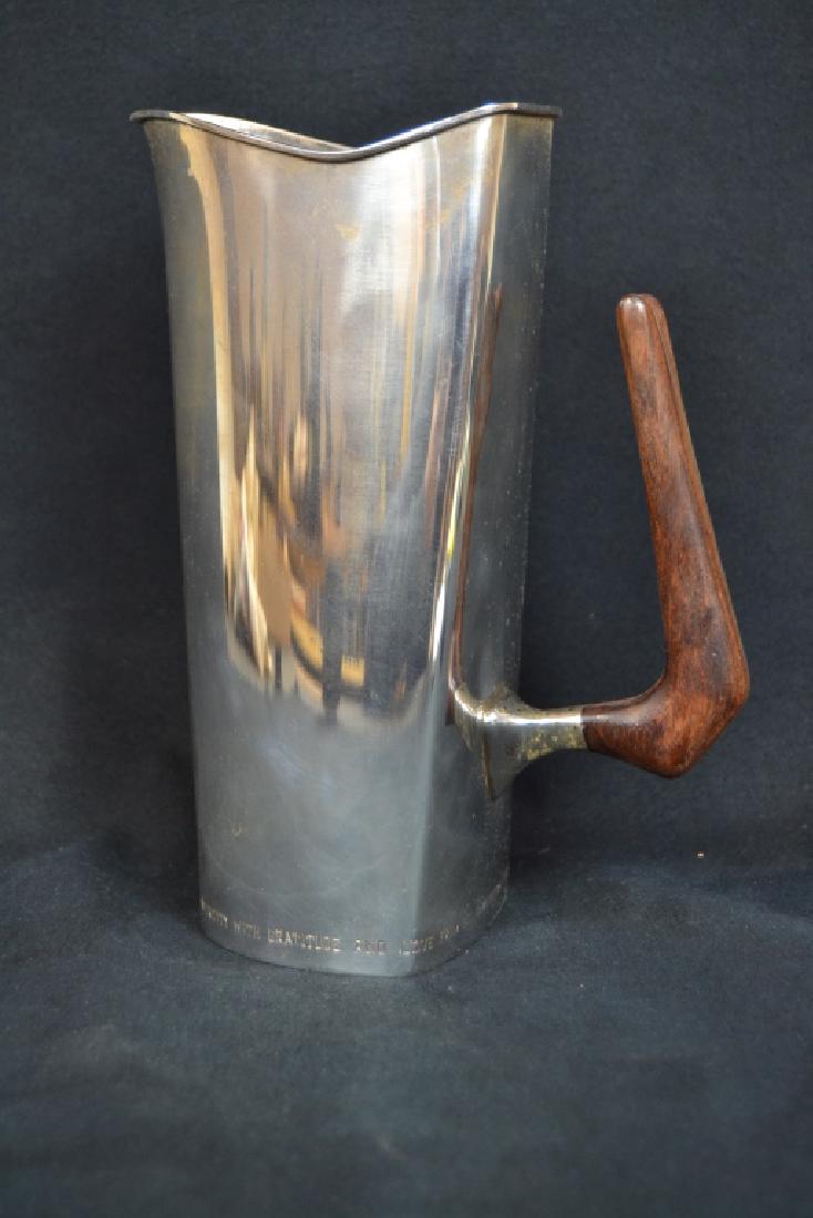 ART DECO STERLING PITCHER WITH WOODEN HANDLE: 8 1/2" TALL--MARKED EDP STERLING ON BASE--MONOGRAMMED AS GIFT AROUND BASE "TO MARSHALL HULBERT FOR 38 YEARS MOLDER OF LAWRENCE UNIVERSITY WITH GRATITUDE & LOVE FROM HIS LAWRENTIAN FRIENDS"--APPROX. 55