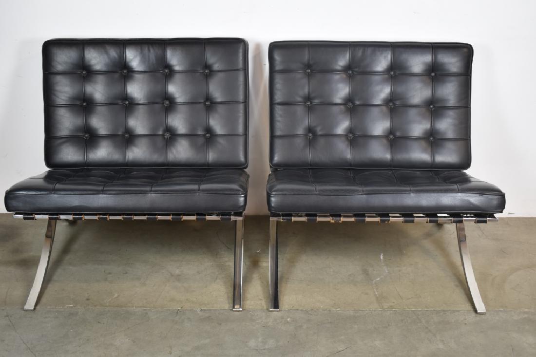 PR. KNOLL BARCELONA BLACK LEATHER CHAIRS: BOTH CHAIRS ARE 30 1/2" TALL X 30 1/2" WIDE X 30" DEEP--STAMPED KNOLL STUDIO MIES VAN DER ROHE ON CHROME OF BOTH CHAIRS--BUCKLE MISSING ON BOTTOM OF ONE CUSHION
