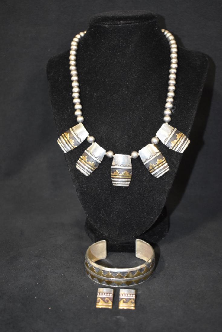 3 PC T & R SINGER NATIVE AMERICAN JEWELRY SET: NECKLACE IS 9 1/2" LONG--CUFF IS 2 1/2" WIDE--EARRINGS ARE 5/8" X 1/2"--STERLING & GOLD--SIGNED T. SINGER & T&R SINGER (TOMMY & ROSITTA) STERLING