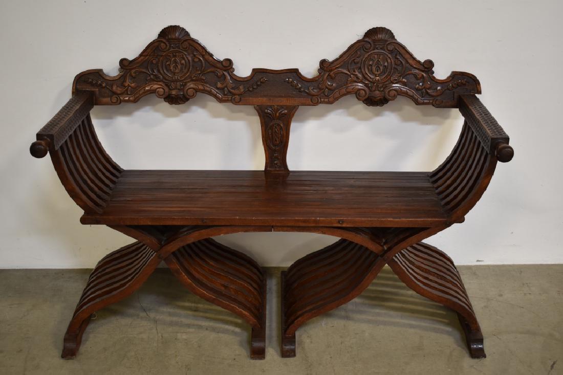 1930'S SPANISH STYLE WALNUT BENCH: 52 3/4" LONG X 36" TALL X 22 3/4" DEEP--HAS ONE SMALL PIECE OF WOOD MISSING ON ONE SIDE (SEE PHOTO)