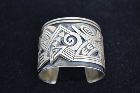 SIGNED LOMAWYWESA HOPI STERLING SILVER CUFF: INTERIOR LENGTH IS 5"--OPENING IS 1 3/16"--BRACELET IS 2 1/8" WIDE--MICHAEL KABOTIE