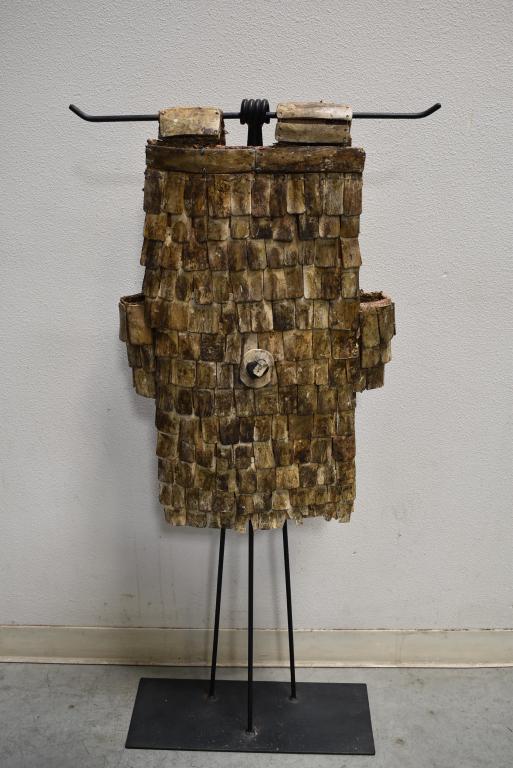 SULAWESI INDONISIAN TORAJAN TRIBAL BONE VEST: ANTIQUE TORAJAN BONE VEST ON CUSTOM IRON STAND. TRIBAL BODY ARMOR