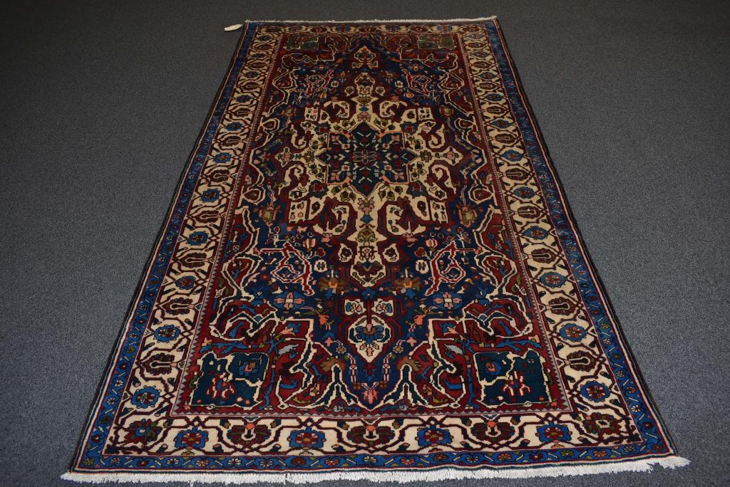 APPROX. 5'6" X 9'9" HANDMADE PERSIAN RUG (1 of 1)