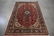 APPROX. 9'9" X 6'6" HANDMADE PERSIAN STYLE RUG