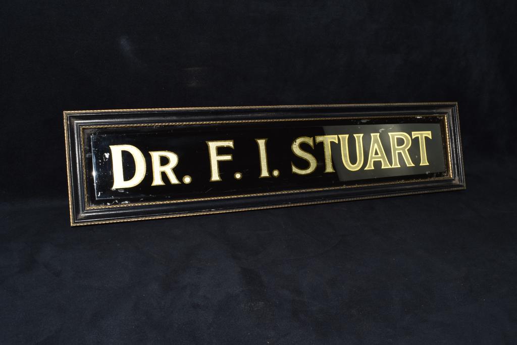 DR. F.I. STUART REVERSE PAINTED GLASS SIGN: 21 1/4" X 5 1/8"