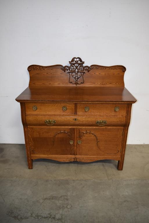 1900'S OAK BUFFET W/ CARVED BACK SPLASH (1 of 2)