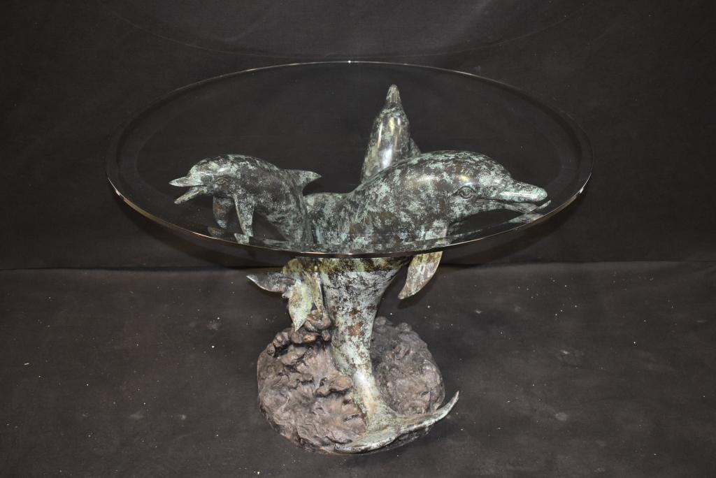 TRIPLE DOLPHIN BRONZE TABLE W/ BEVELED GLASS TOP: 42" DIAMETER X 29 3/4" TALL