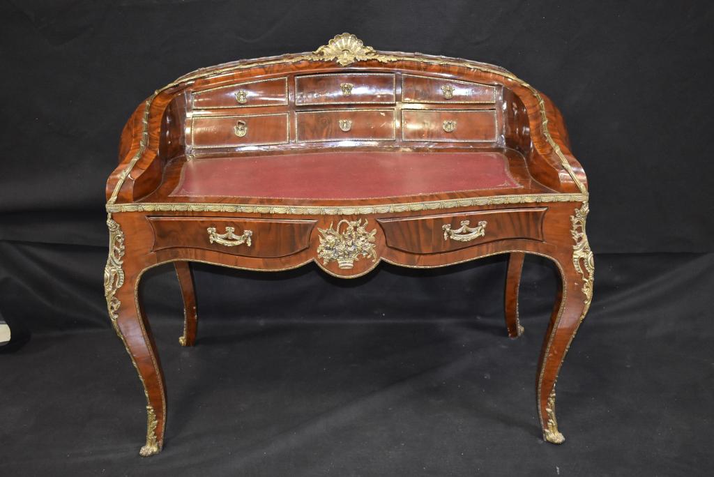 FRENCH LOUIS XV STYLE DESK W/ RBONZE ORMOLU: 51" WIDE X 32" DEEP X 43" TALL--8 DRAWERS WITH LEATHER TOP--NICE BRONZE FLOWER BASKETS & FIGURES--SOME VENEER DAMAGE (SEE PHOTOS)