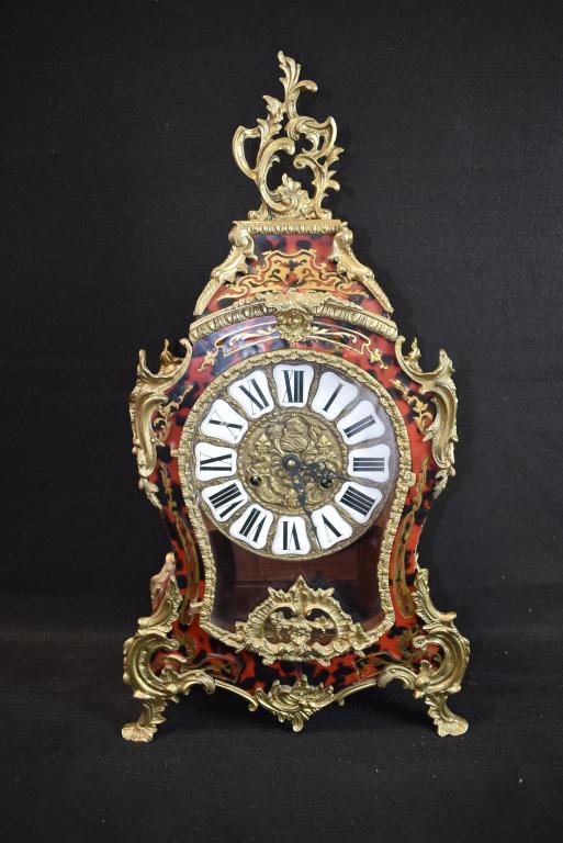 FRENCH BOULLE CLOCK W/ ORMOLU: 23" TALL--REPAIRS TO BRASS INLAY ON BOTH SIDES & FRONT--HAS PENDULUM & KEY--ALL CLOCKS SOLD ASIS WITHOUT GUARANTEE OF WORKING ORDER