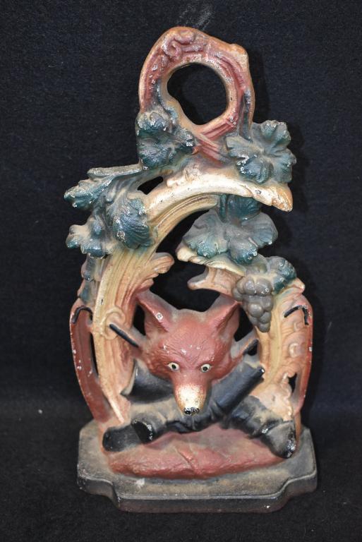 ANTIQUE CAST IRON HUNTING THEMED DOOR STOP: DATED 1949--11" TALL