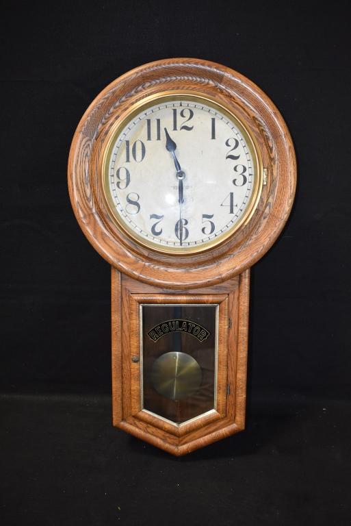 NEW HAVEN SCHOOL HOUSE REGULATOR OAK WALL CLOCK: 33 1/4" TALL--18 1/2" DIAMETER FACE--HAS PENDULUM & KEY--ALL CLOCKS ARE SOLD ASIS WITHOUT GUARANTEE OF WORKING ORDER