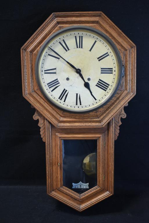 ANTIQUE OAK ANSONIA REGULATOR WALL CLOCK: 32 1/2" TALL X 17 1/2" WIDE--HAS PENDULUM & KEY--SOME WEAR TO DIAL--ALL CLOCKS ARE SOLD ASIS WITHOUT GUARANTEE OF WORKING ORDER