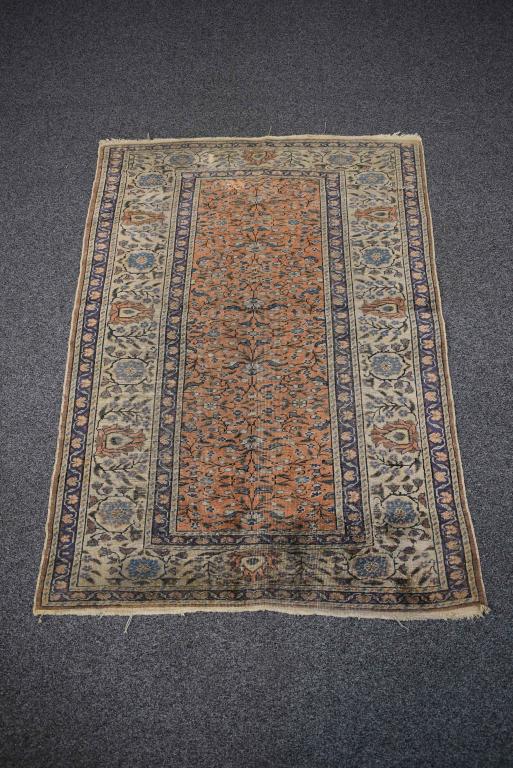 APPROX. 4'8" x 3'3" HANDMADE PERSIAN RUG: NEEDS TO BE CLEANED & HAS 1 HOLE