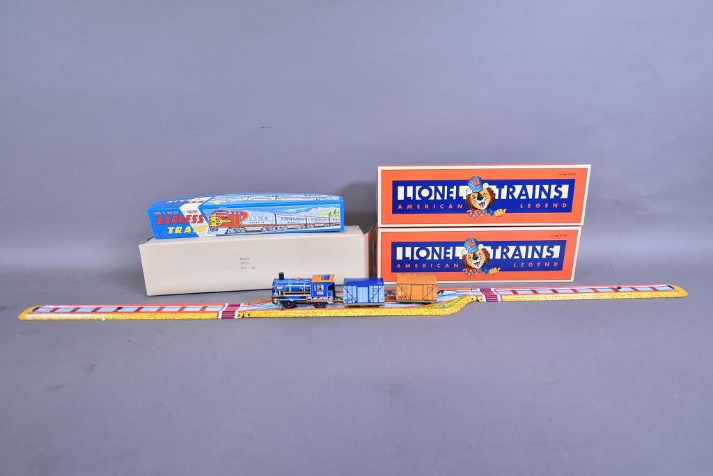 5 TIN TOY TRAINS: 2 LIONEL, 2 HUNGARIAN, & 1 JAPANESE