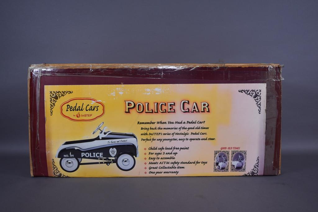 NEW IN BOX POLICE CAR PEDAL CAR (1 of 2)