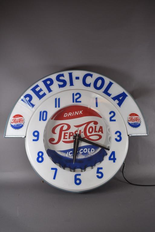 CAVALIER PEPSI COLA NEON CLOCK: 31" DIAMETER--WORKING--ALL CLOCKS ARE SOLD ASIS WITH NO GUARANTEE OF WORKING ORDER--NO IN HOUSE SHIPPING FOR NEON SIGNS, LOCAL PICK UP OR PLEASE ARRANGE FOR YOUR OWN SHIPPER
