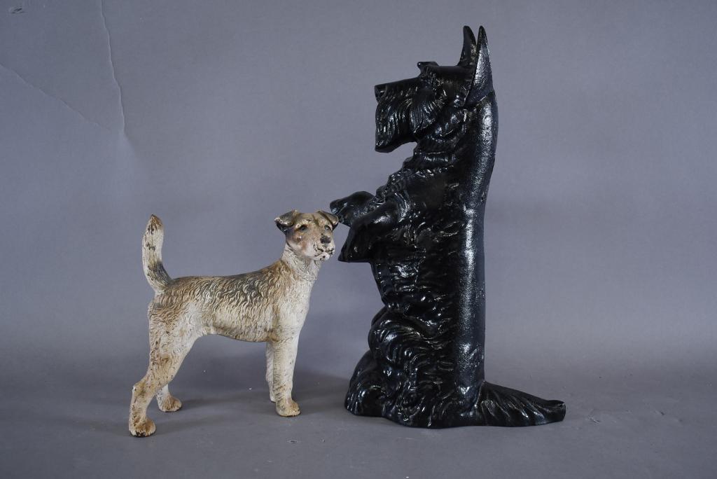 2 CAST IRON DOG DOORSTOPS (1 of 3)