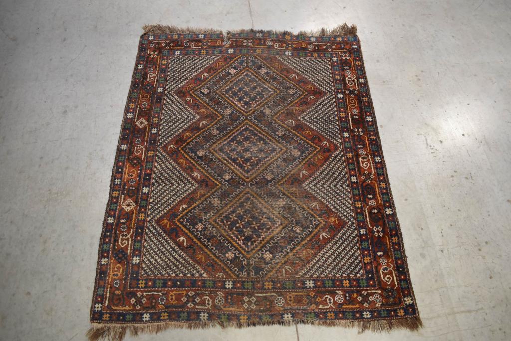 APPROX. 6' 1" X 4' 10" HANDMADE PERSIAN TRIBAL RUG: WORN & RIP ON ONE END
