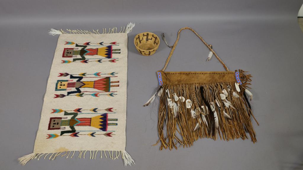 NAVAJO YEI RUG/POPAGO BASKET/QUIVER: BASKET IS 7 1/2" DIAMETER--LEATHER & ANTLER QUIVER (ARROW BAG) IS 40" TALL X 23" WIDE (IHEIGHT INCLUDES HANDLE)--YEI RUG IS 38" X 22" (HAS STAINS)