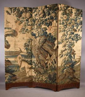 BILLY HAINES 3 PANEL TAPESTRY SCREEN: BAROQUE PASTORAL TAPESTRY SCREEN--WILLIAM "BILLY" HAINES -- DEPICTING EXOTIC LANDSCAPE WITH GREEK KEY WOODEN SURROUND -- TOGETHER WITH A FLEMISH TAPESTRY MOUNTED 3 PANEL FOLDING SCREEN -- LOT 347 IN C