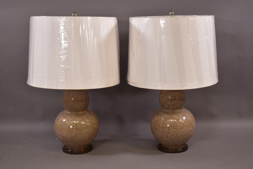 PR. OF PORCELAIN LAMPS BY JOHN THOMPSON: DOUBLE GOURD LAMP -- MOCHA AND IVORY CRACKLE GLAZE ON PORCELAIN -- EBONY BASE -- POLISHED NICKLE FITTINGS -- 31" H