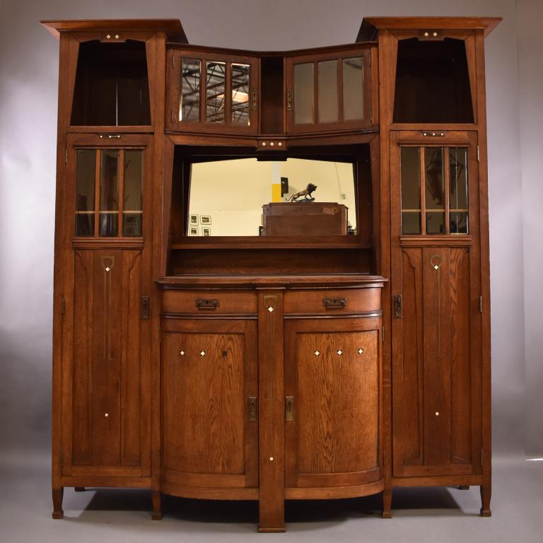 FRENCH ARTS AND CRAFTS INLAID SIDEBOARD CABINET: INLAY THROUGHOUT WITH MIRRORED BACK -- NO KEY -- FINISH IN GOOD CONDITION -- MISSING SOME INLAY -- REPAIR TO FRONT -- BACK PANEL HAS SPLIT -- 74" x 24" x 81"