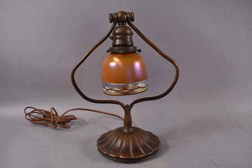 TIFFANY STUDIOS BRONZE BELL FORM DESK LAMP: BASE MARKED TIFFANY STUDIOS NY 21217 -- ART GLASS SHADE MARKED STEUBEN -- GOOD CONDITION -- 9 1/2" W x 12 3/4" H