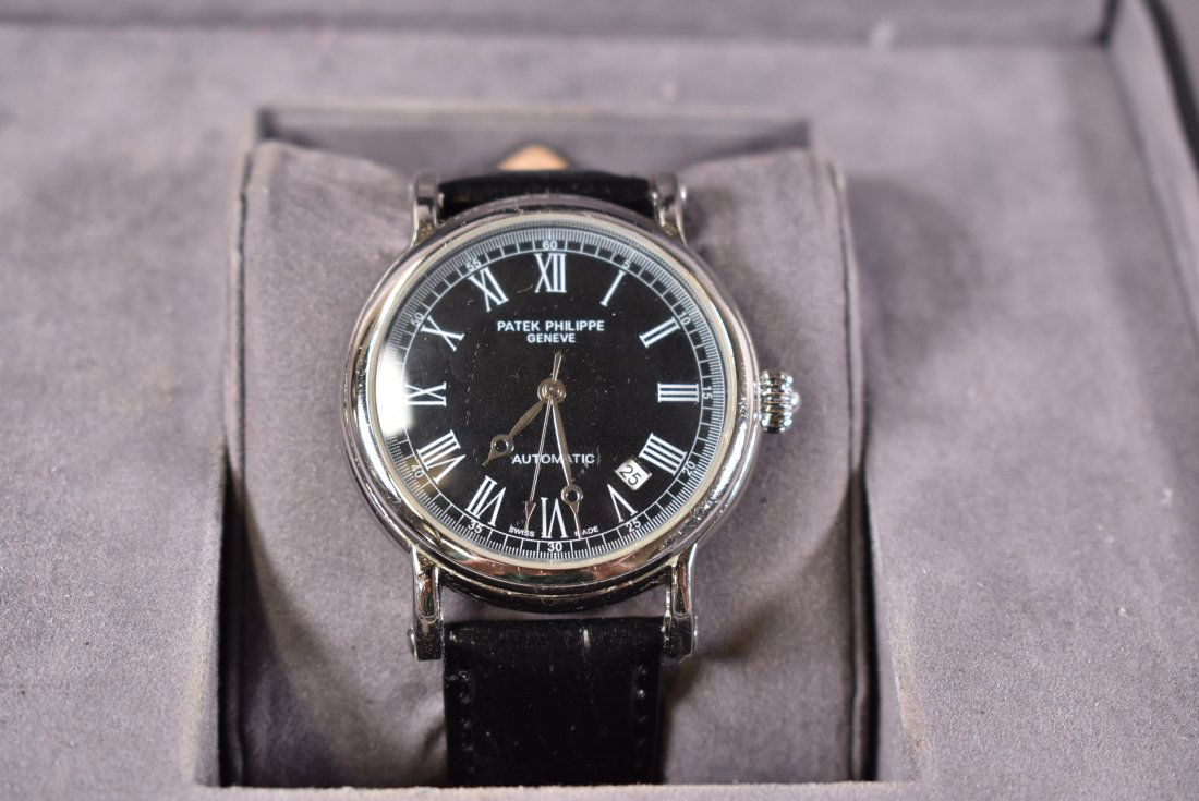 REPLICA PATEK PHILIPPE GENTLEMAN'S: AUTOMATIC WITH NEW LEATHER BAND--APPEARS TO WORK BUT ALL WATCHES SOLD ASIS--WATCH HAS SOME WEAR