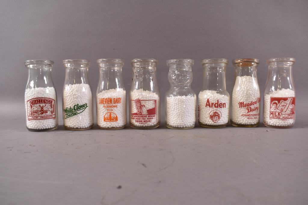 8 VINTAGE HALF PINT MILK BOTTLES: 5 1/2" H. CHALLENGE, WHITE CLOVER, LAKEVIEW, ARDEN, MEADOW VIEW, BROOKFIELD (BABY FACE), 2 COMOLAC. MOST ARE CALIFORNIA--ALL IN GOOD CONDITION NO CHIPS CRACKS OR BREAKS