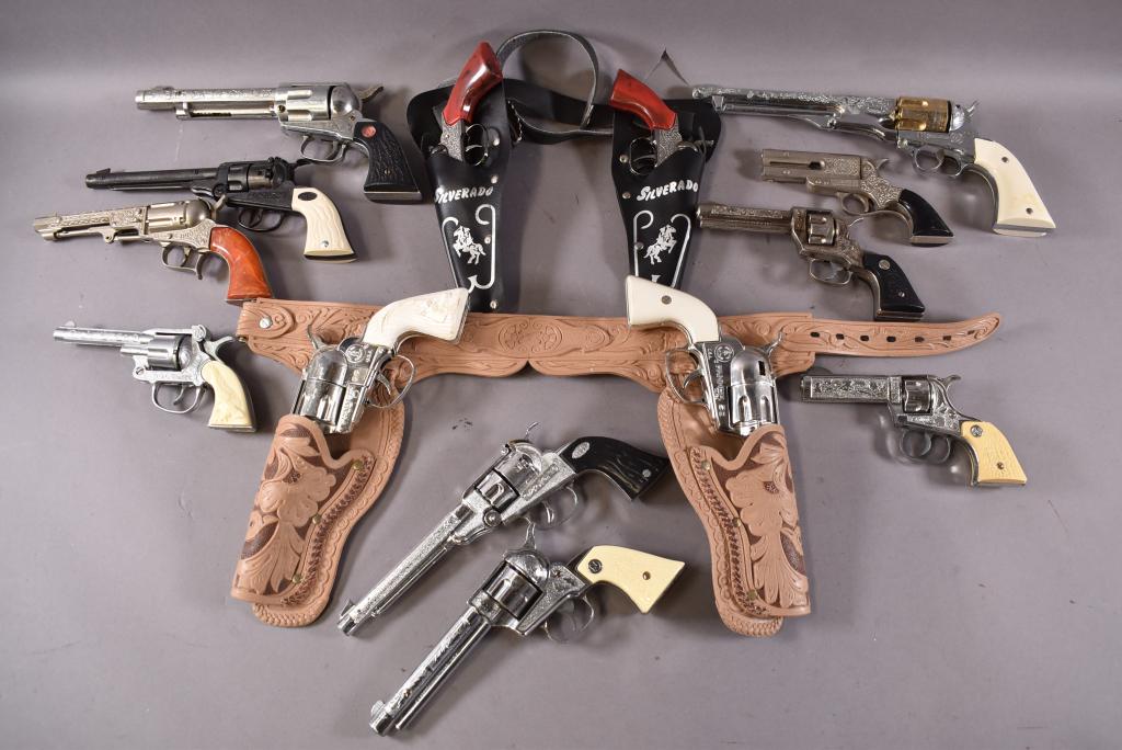 15 MISC. CAP GUNS: 15 GUNS, 2 WITH HOLSTERS. INCLUDING MATTEL, NICHOLS, & HUBLEY.