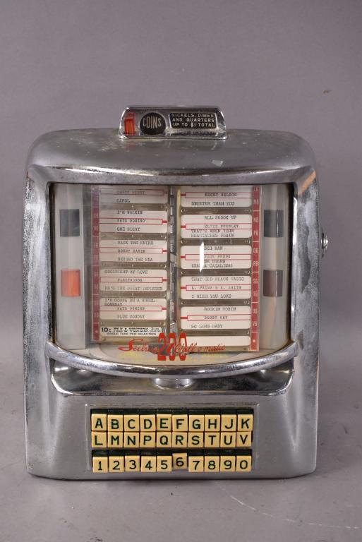 SEEBURG WALL O MATIC TABLE TOP JUKEBOX REMOTE: 12" x 7" x 15". CHROME IS PITTED, NO KEY.