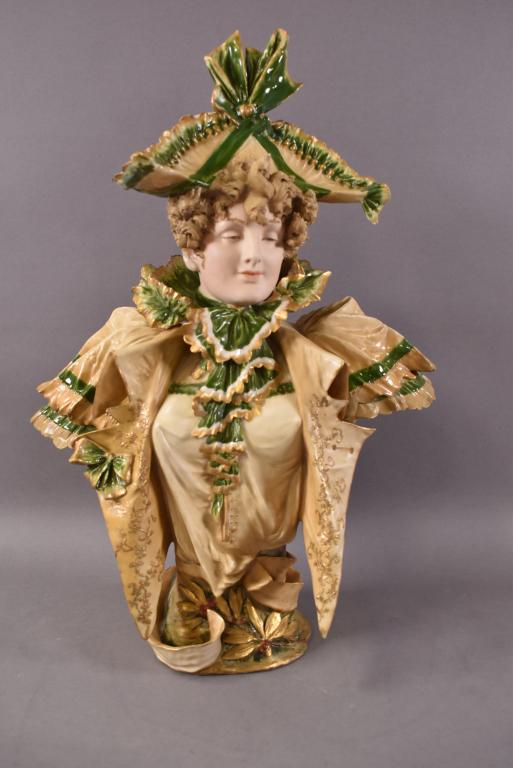 AMPHORA PORCELAIN LADY BUST: ATTRIBUTED TO ERNEST WAHLISS, IMPRESSED ON BASE 4106. REPAIRS AND REPAINT TO BOTH SHOULDERS. 20 1/2" H