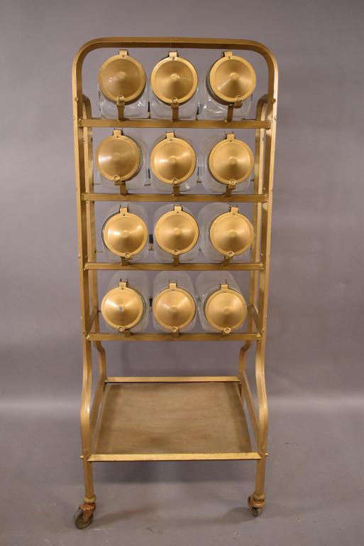 ANTIQUE COUNTRY STORE CANDY CART W/ GLASS JARS: 12 LIDDED JARS ON ROLLING CART. EACH JAR HAS HINGED LID & CART HAS LOWER SHELF. HAS BEEN REPAINTED. 22" x 59"