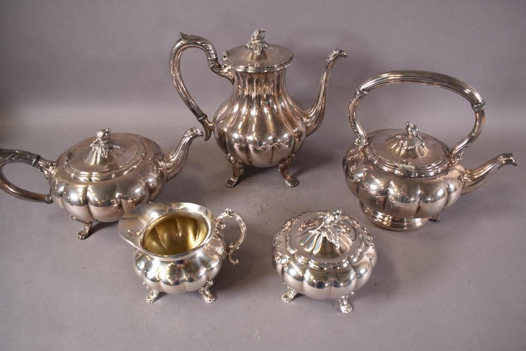 HERLOOM SILVER PLATE 5 PIECE TEA SET: MELON PATTERN. MARKED ON BOTTOM. TIPPING KETTLE IS MISSING KETTTLE HOLDER. 1 LID IS DETACHED.