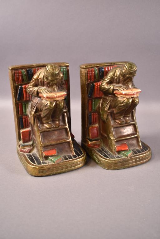 PAIR OR MARRION BRONZE POLYCHROME BOOKENDS: SCHOLAR READING BOOK MOTIF. MARKED M.B. SOME WEAR BUT OVERALL GOOD CONDITION. BRONZE COATING OVER PLASTER