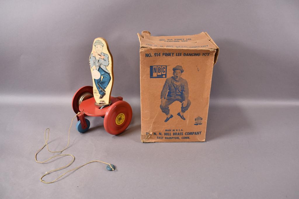 PINKY LEE NBC WOODEN PULL TOY IN ORIGINAL BOX: 10 1/2" TALL. BOX IS ASIS. WOOD TOY ON METAL BASE