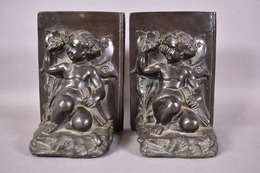 PAIR OF 1930'S METAL FAIRY BOOKENDS: GOOD CONDITION. 3 1/4" x 5 1/2"