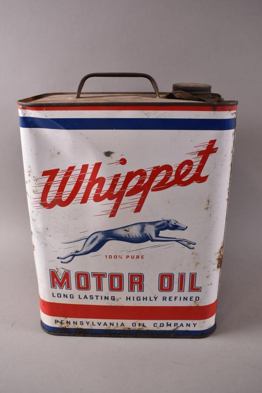 2 GALLON WHIPPET OIL CAN: MINOR RUST AND WEAR. DENTS. GOOD OVERALL CONDITION.