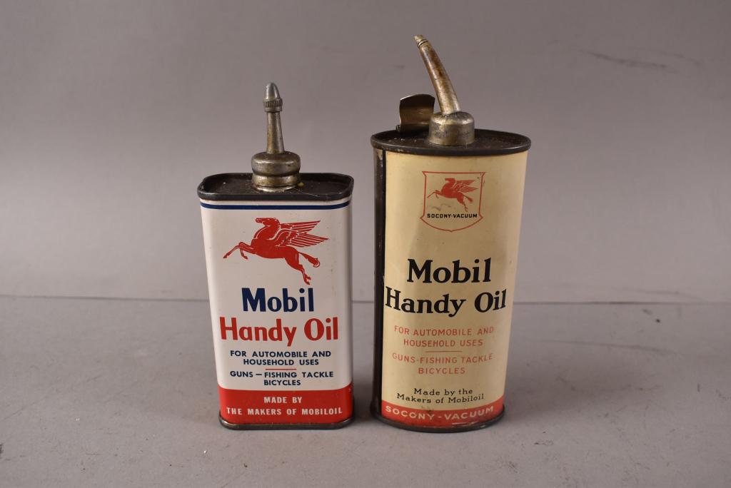 2 MOBIL HANDY OIL CANS: BOTH HAVE LIDS AND SPOUTS. MINOR SURFACE WEAR, GOOD CONDITION OVERALL.
