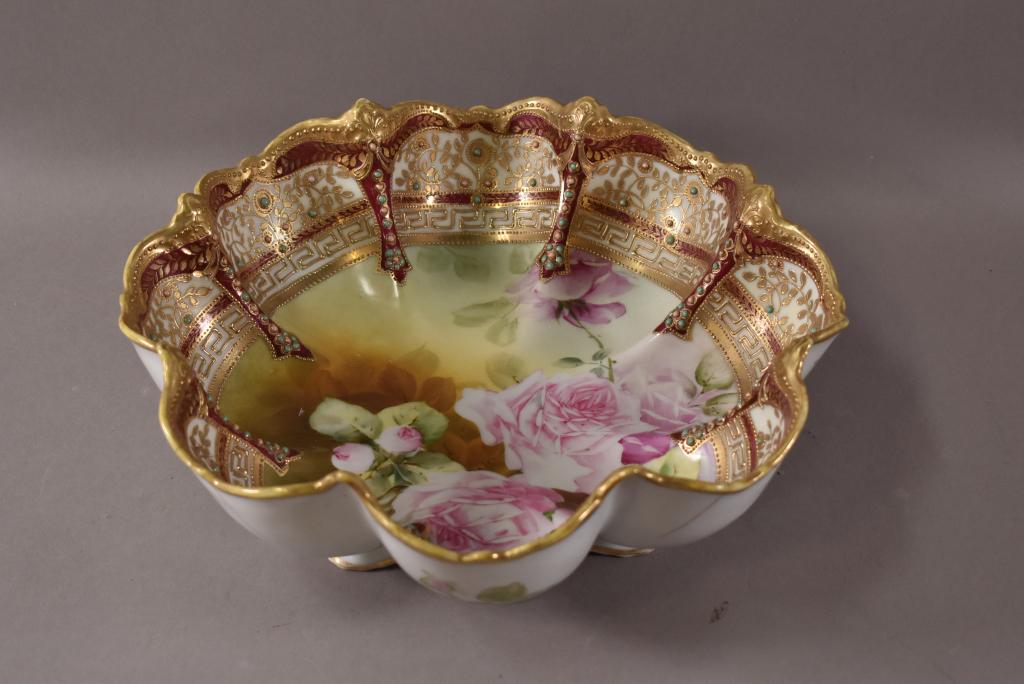 HAND PAINTED NIPPON PORCELAIN BOWL: GOLD STIPPLE GROUND, FLORAL DESIGN. AGE CRACKS TO SIDE AND BOTTOM. 11" DIAM.