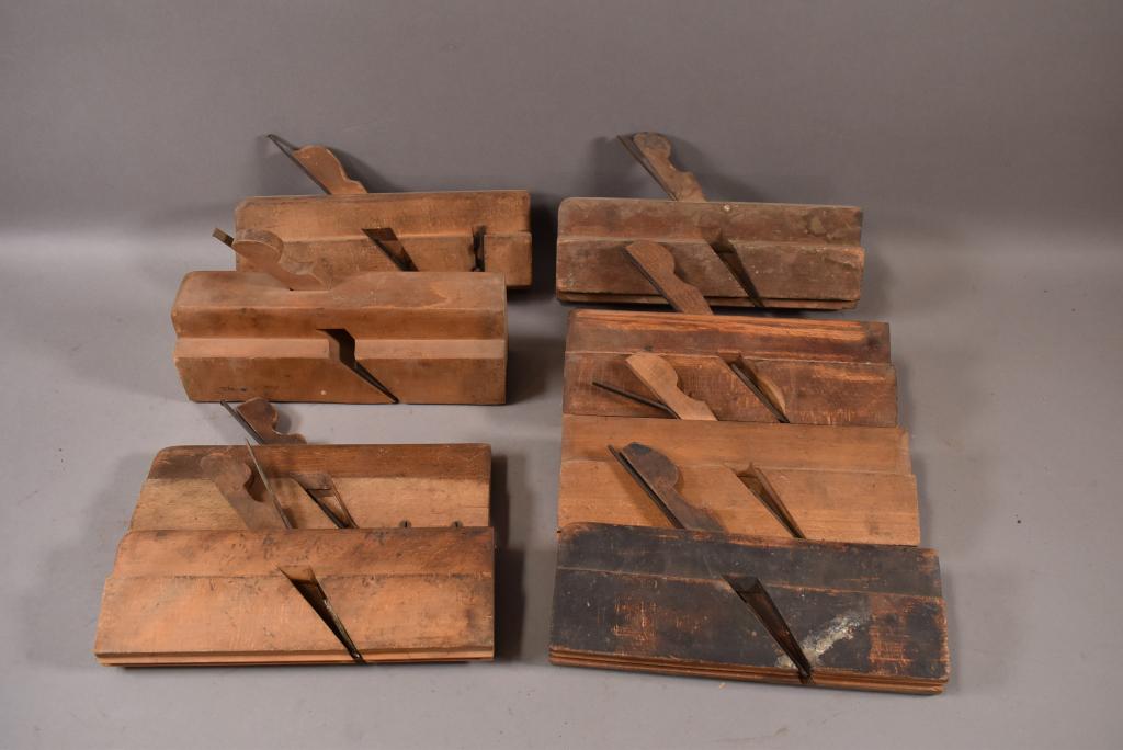 8 WOODEN MOLDING PLANES: ORIGINAL AS FOUND CONDITION. UNKNOWN IF COMPLETE.