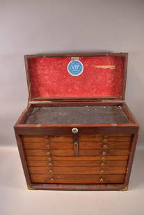 VINTAGE TOOL OR MACHINIST'S BOX: 12 DRAWERS AND LIFT TOP COMPARTMENT. DOOR IS NOT ATTACHED AND HAS DAMAGE. 20" x 10" x 17"