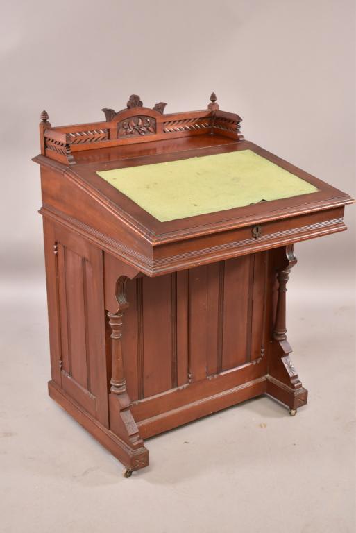 VICTORIAN WALNUT DAVENPORT DESK: FELT WRITING SURFACE, 4 DRAWER SIDE. FINISH LOSS, STAINS, LIFTING TO FELT. 25 1/4" x 24" x 37". THIS ITEM EXCEEDS SIZE LIMITATIONS FOR IN HOUSE SHIPPING.