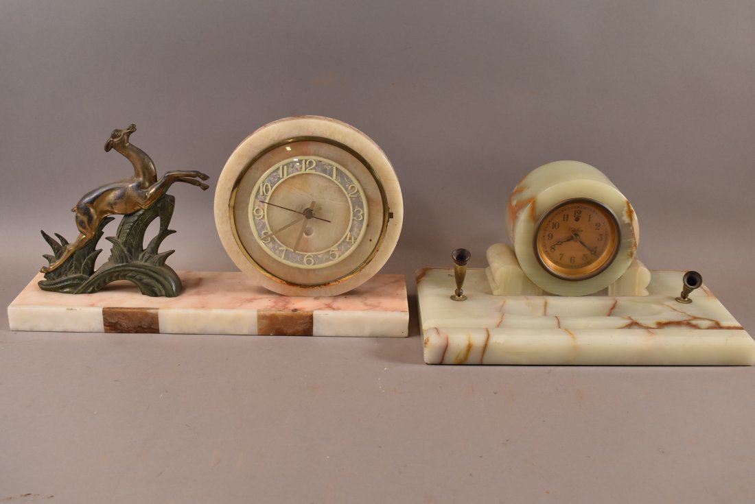 2 MARBLE & ONYX CLOCKS: 1 HAS AN ELECTRIC CLOCK & PEN HOLDERS. THE OTHER HAS A BATTERY REPLACED MOVEMENT. BOTH HAVE MINOR CHIPS. WE SELL ALL CLOCKS ASIS WITHOUT ANY GUARANTEE OF WORKING ORDER. DEER CLOCK IS 18" X 9 1/2". PEN