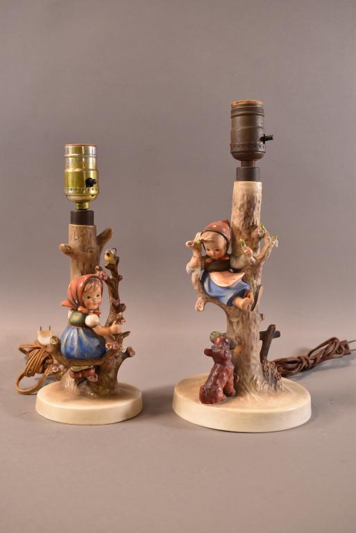 2 HUMMEL LAMPS: 229 & 44/B MARKS ON BOTTOM. GOOD OVERALL CONDITION. 9 1/4" H & 10 1/2" H