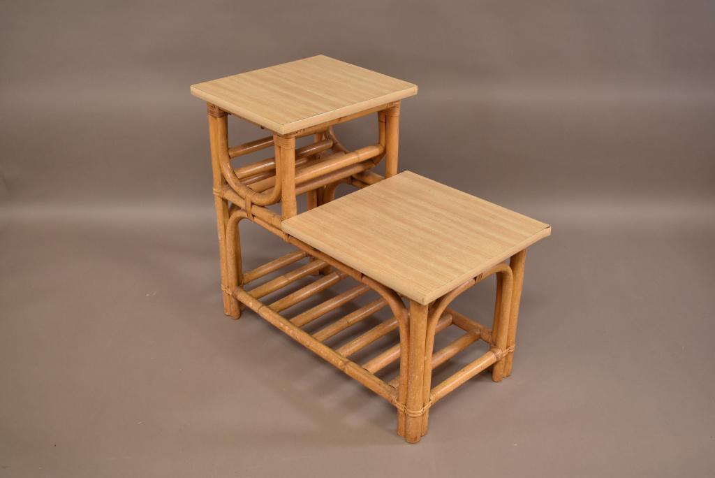 1950'S RATTAN STEP TABLE WITH FORMICA TOP: WEAR TO FINISH, LOOSE CORNER MOULDING. 16" W x 29 1/2" D x 25" H. THIS ITEM EXCEEDS SIZE LIMITATIONS FOR IN HOUSE SHIPPING.