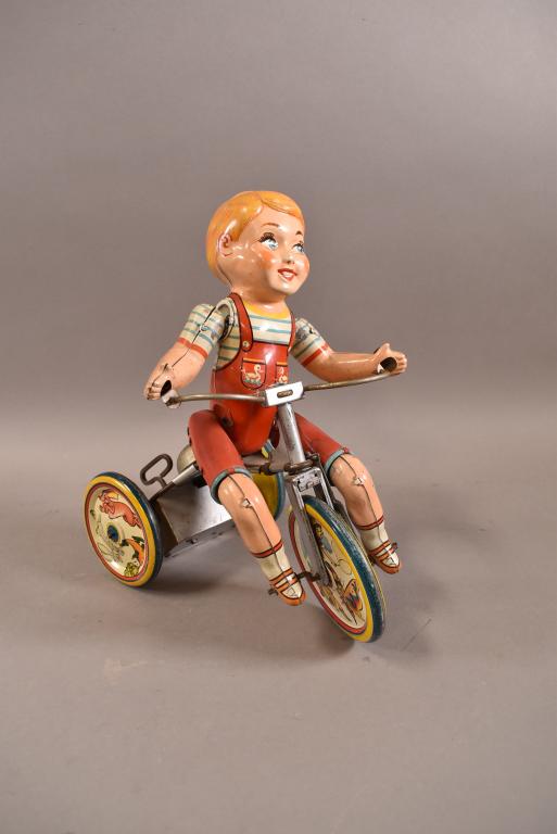 UNIQUE ART KIDDY CYCLIST WIND UP TOY (1 of 5)