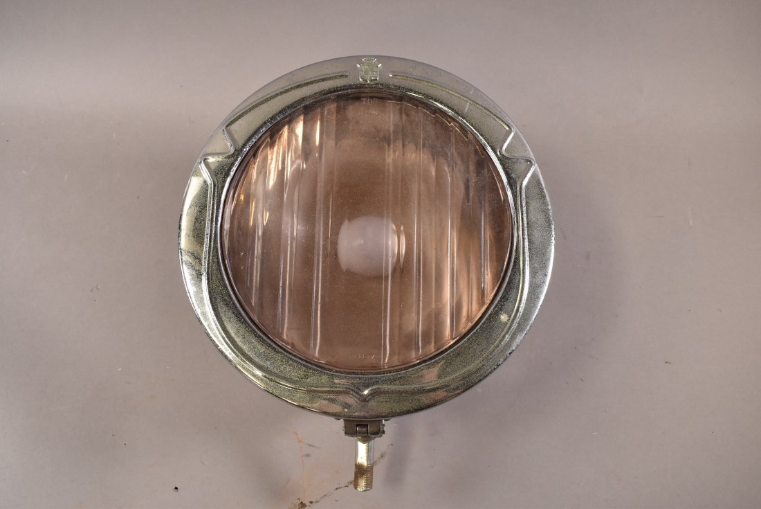 ANTIQUE CADILLAC HEADLIGHT: MARKED BAUSCH AND LOMB TYPE "A" ON LENSE AND HAS CADILLAC EMBLEM IN METAL FRAME. GOOD CONDITION 11" DIAMETER