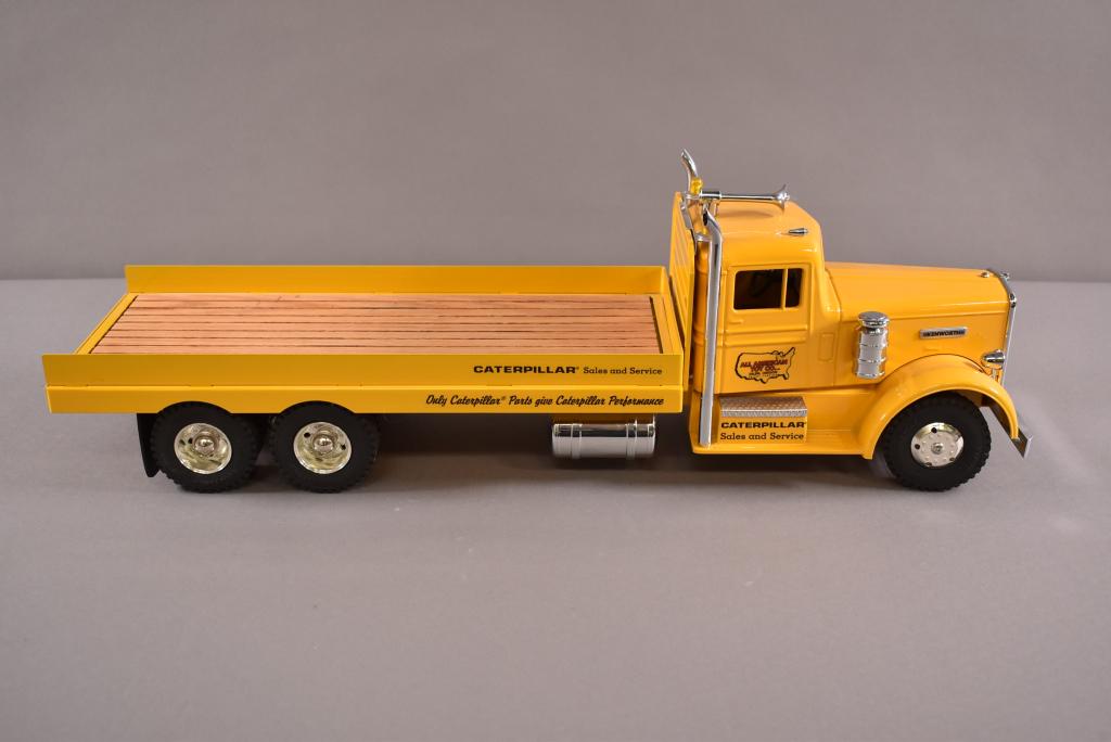 ALL AMERICAN LIMITED EDITION CATEPILLAR HAULER: NEAR MINT CONDITION. ALL AMERICAN KENWORTH 1 OF 100. LIMITED EDITION TRACTOR HAULER. 23" L.
