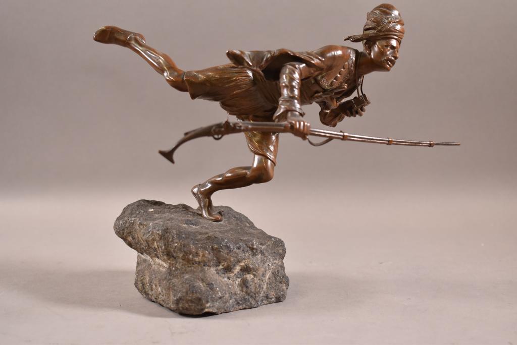 FRANZ BERGMANN FIGURAL BRONZE: SIGNED & NUMBERED FRANZ BERGMANN MAN WITH RIFLE BRONZE ON STONE BASE. NUMBERED 5301 WITH BERGMANN MARK. GOOD PATINA. RIFLE IS SLIGHTLY BENT. 7 3/4" H